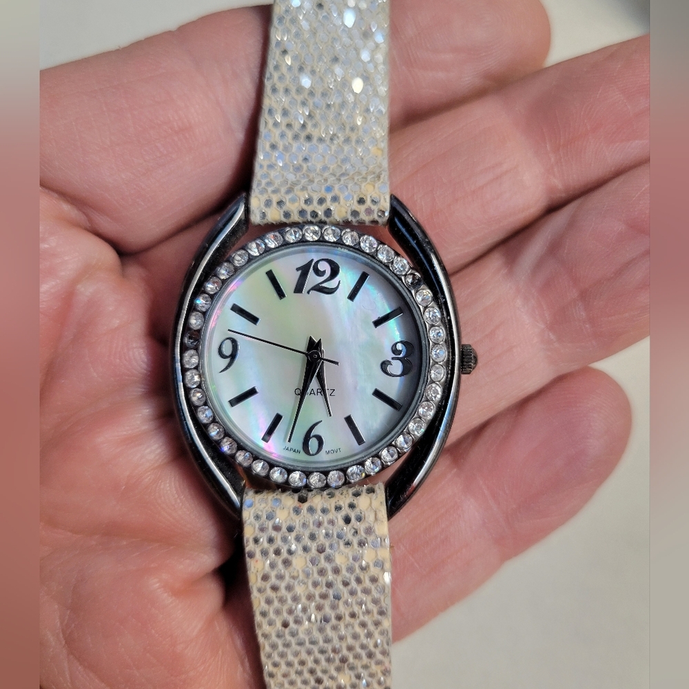 Ladies mother of pearl dial watch